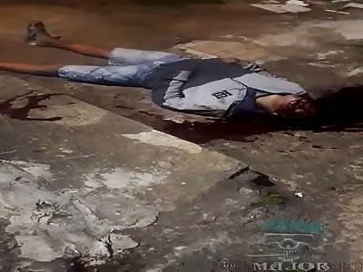 murdered man with headshots in Brazil