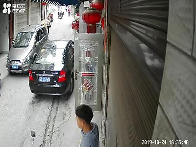 two man fight with machete in street