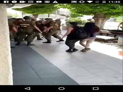 protesters beaten by police in chile