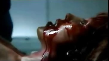 Fucked up mortician cuts up a girl before fucking her bloody corpse