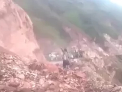 A Real Peruvian Witch tries Stopping a Land Slide....
