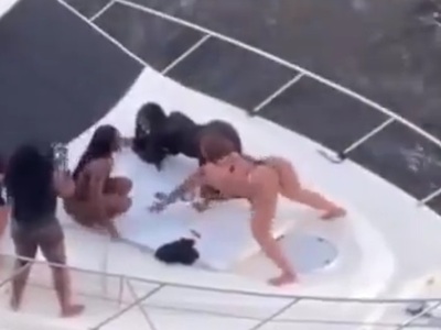 One Boat having a Wedding has All the Attention of the Groomsmen