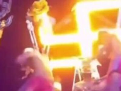 White Supremacists Hang from the Neck from Swastika