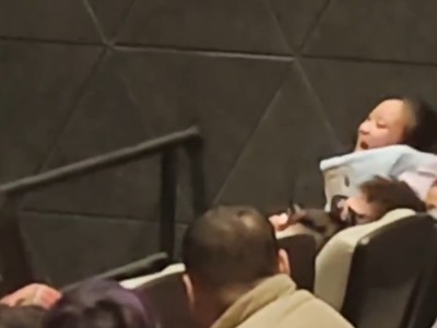 Maniacal Girl in the Movie Theatre Pisses Off the Crowd