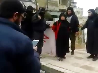 Scared Woman in Red Coat is Executed Violently with a Gunshot To the Head Publically on the Street