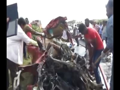 One Man Burnt to a Crisp Inside his Car and a Midget Lays Dead on the Street after Horrible Accident