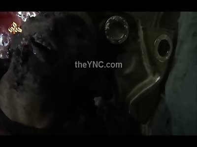 New ISIS Carnage Video with Men Being Strung up like Hogs and a Beheading