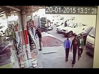 Man Working outside of his Store is Crushed by Idiotic Porsche Cayenne