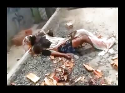 Suffering Rapist was Beaten and Burned on a Street Curb...Still Smoking