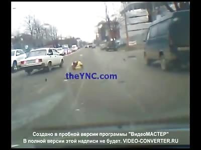 Attractive Female in Yellow Overcoat and High Heels Forgets about the Other Car.....(Watch Slow motion) 