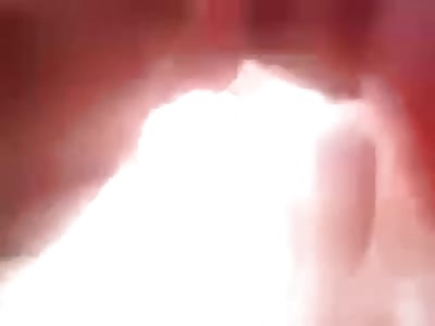 Cowering Half Naked Woman is Brutally Beaten by Residents of the Town 