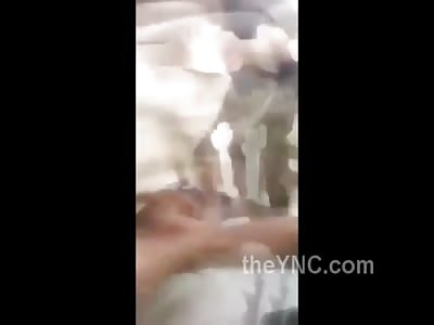 Solider Celebrating the Death of a ISIS Sniper ... With his Body