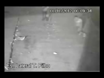 Man Sweeping the Street watches as Man is Executed Point Blank in the Street 