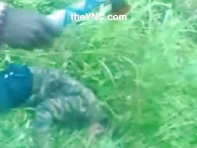 Cell Phone Video shows Man Murdered with an Ax and thrown into the Brush