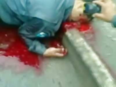 Police Officer's Brains Blown out onto the Sidewalk, Cameraman gets inside View of his Skull