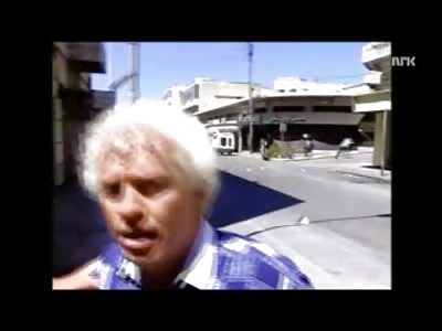 Norwegian Reporter stands in the Middle of Gunfight and Doesn't Even Flinch