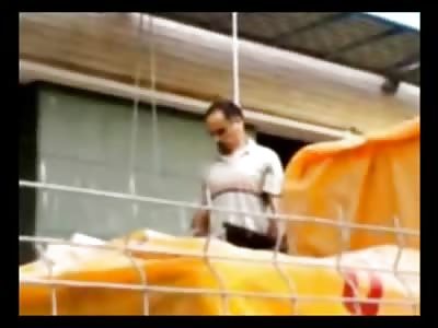 Crafty Construction Worker somehow Hangs Himself from the TOP of a Building 