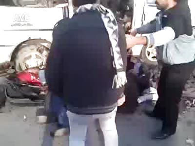 Bombing Leaves Them Dead and Beyond Help