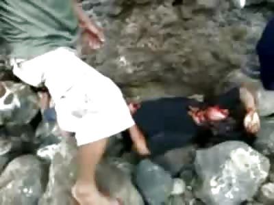 Murdered Woman found on Rocks by the Water 