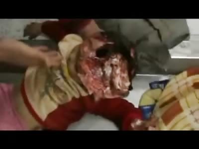 Horrific Video of a Mother and her Daughter with  Daughter's Head Blown to Bits