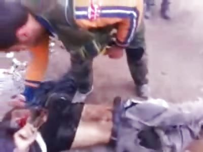 Dead Man Stabbed in the Stomach and Set on Fire by Maniacs in Syria