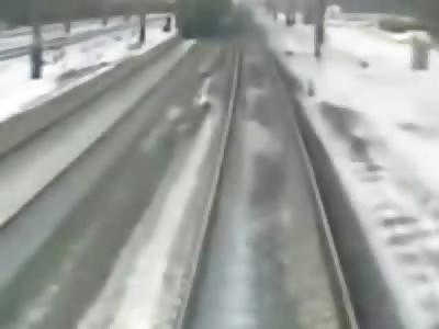 Oblivious Train Station Employee Cleaning the Tracks is Runover by Train