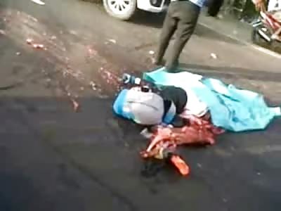 This Man is Still Alive but they still Cover him with Tarp (watch his hand)