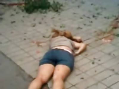 Back view of Suicide of the Woman who Jumped from the Roof and Her Brain Came Out 