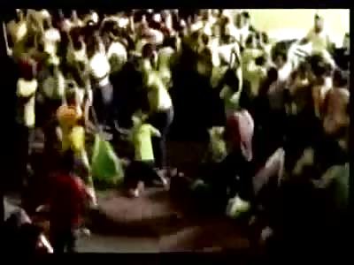 Knife Wielding Lunatic Attacks Crowd at an Ecuadorean Political Rally Killing Two 