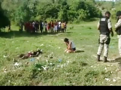 Poor Mother Grieves over the Body of her Dead 15 Year Old Kid Who Was Shot and Burned to Death