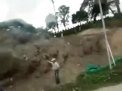 Man Protesting Coffee Prices in Colombia gets a BANG!!