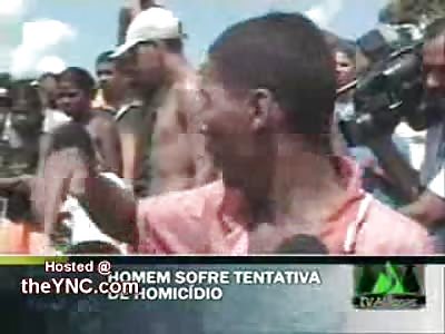 Guy on the Streets Shot and Dying as Crowd Just Stands There.