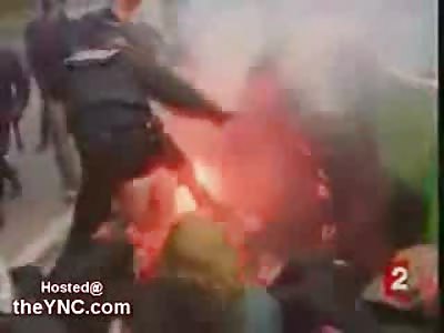 Olympic Torch Protestors light their own Torch and get roughed up in Paris