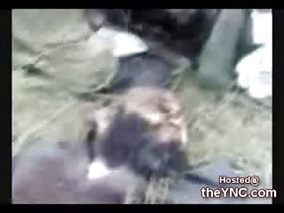 Algerian Soldiers show off their Killed and Captured Al Qaeda Generals