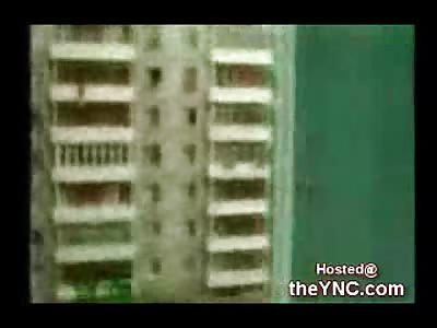 Kid hanging from his Balcony Lands on his Head