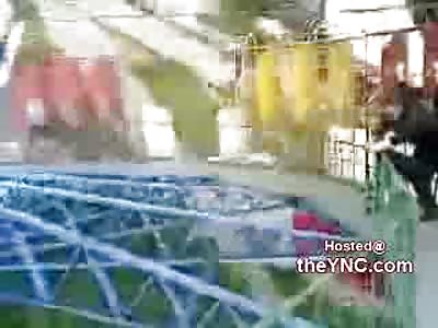 Drunken Russian Idiot Falls off of Carnival Ride
