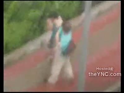 Complete Asshole Beats his Wife in Broad Daylight 