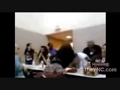 Girl gets Dragged across Cafeteria Table in Ridiculous Girl Fight