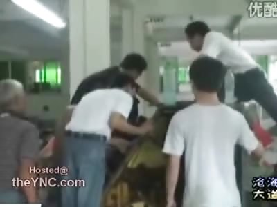Mans Arm Caught in a Machine at Work