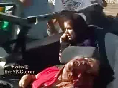 Girl makes a Phone Call in the Back Seat while the Dead Sit and Wait in the Front Seat