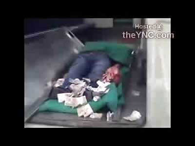 WTF: People Throwing Money at the Dead Beheaded Guy?!?!?