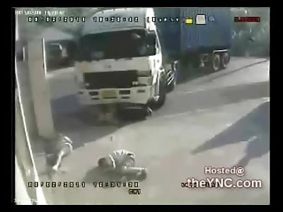 2 Boys on a Moped Brief Encounter with the Local Garbage Truck