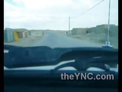 Suicide Bomber next o Humvee Detonates on his Feet (Watch Slow Motion)