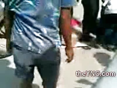 Young Female Pulled out from Underneath Truck Tire with Flattened Head