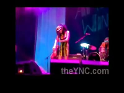 Amy Whinehouse Drunk Ass Booed as She Gives Probably the Worst Performance in the History of Concerts...WTMF