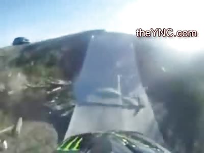 OMG: Helmet Cam, Biker Lands on Top of Girls Head in Jump off of Large Hill
