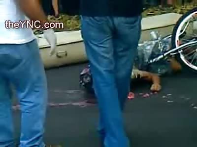 Boy with his School Backpack still On was Run Over in the Street