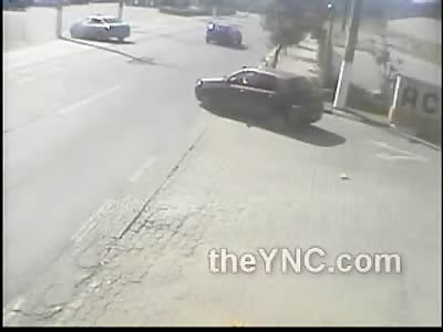 Motorcycle Takes Direct hit and Gets Sent Flying Superman Style.....Damn!