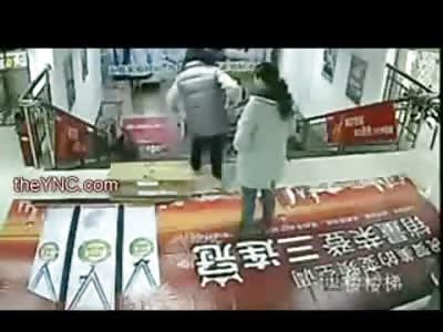 Crazy Asian Girl uses a Stairwell to Break Bones of Female on her Cell Phone