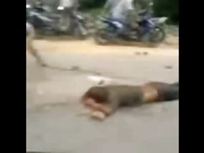 Head Smashed In: Barbaric and Shocking Video shows Man Beaten to Death with Cement Blocks, Sticks and Kicks by Angry Mob (Watch FULL Video)